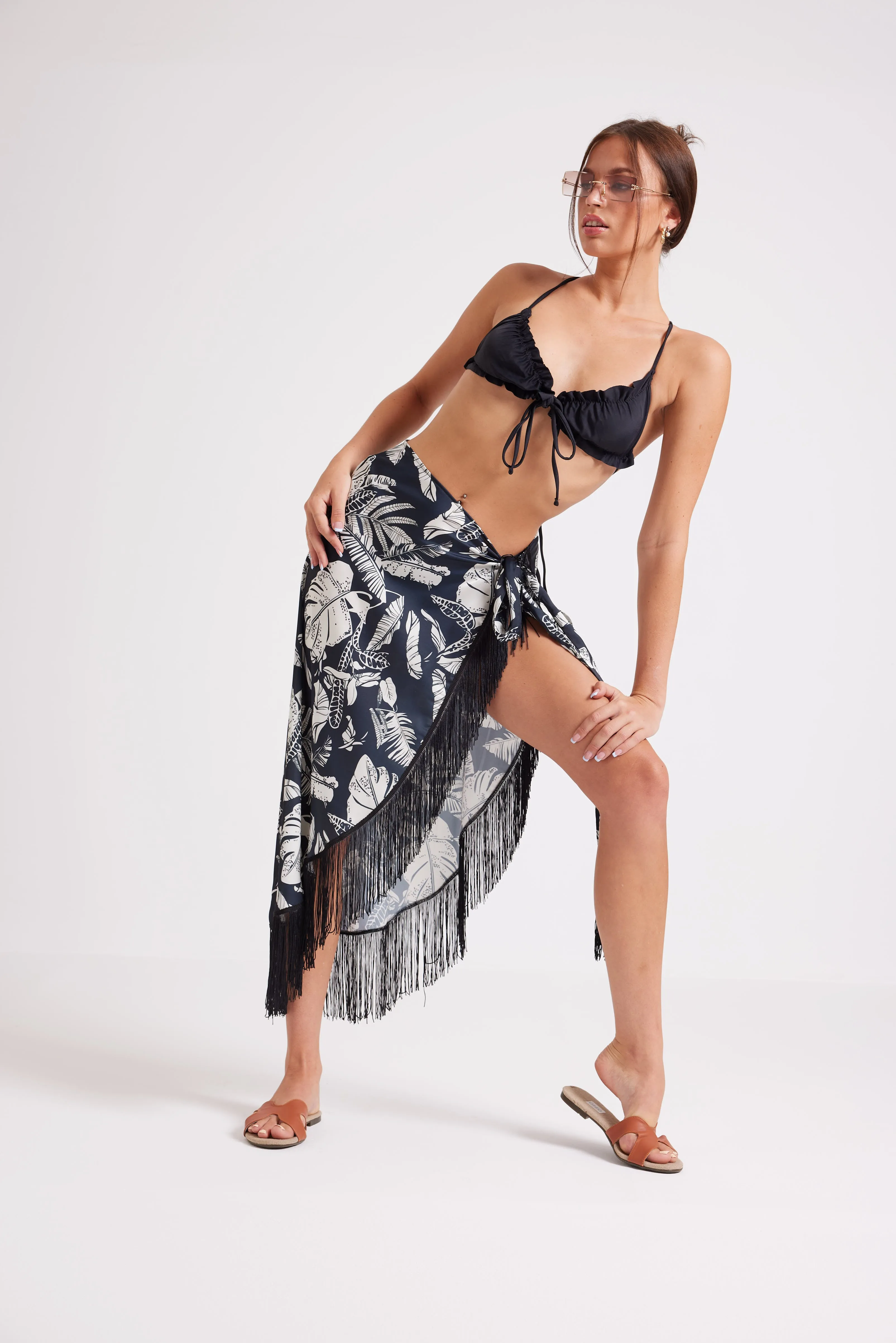 FEEL THE VIBE TASSEL SKIRT - BLACK