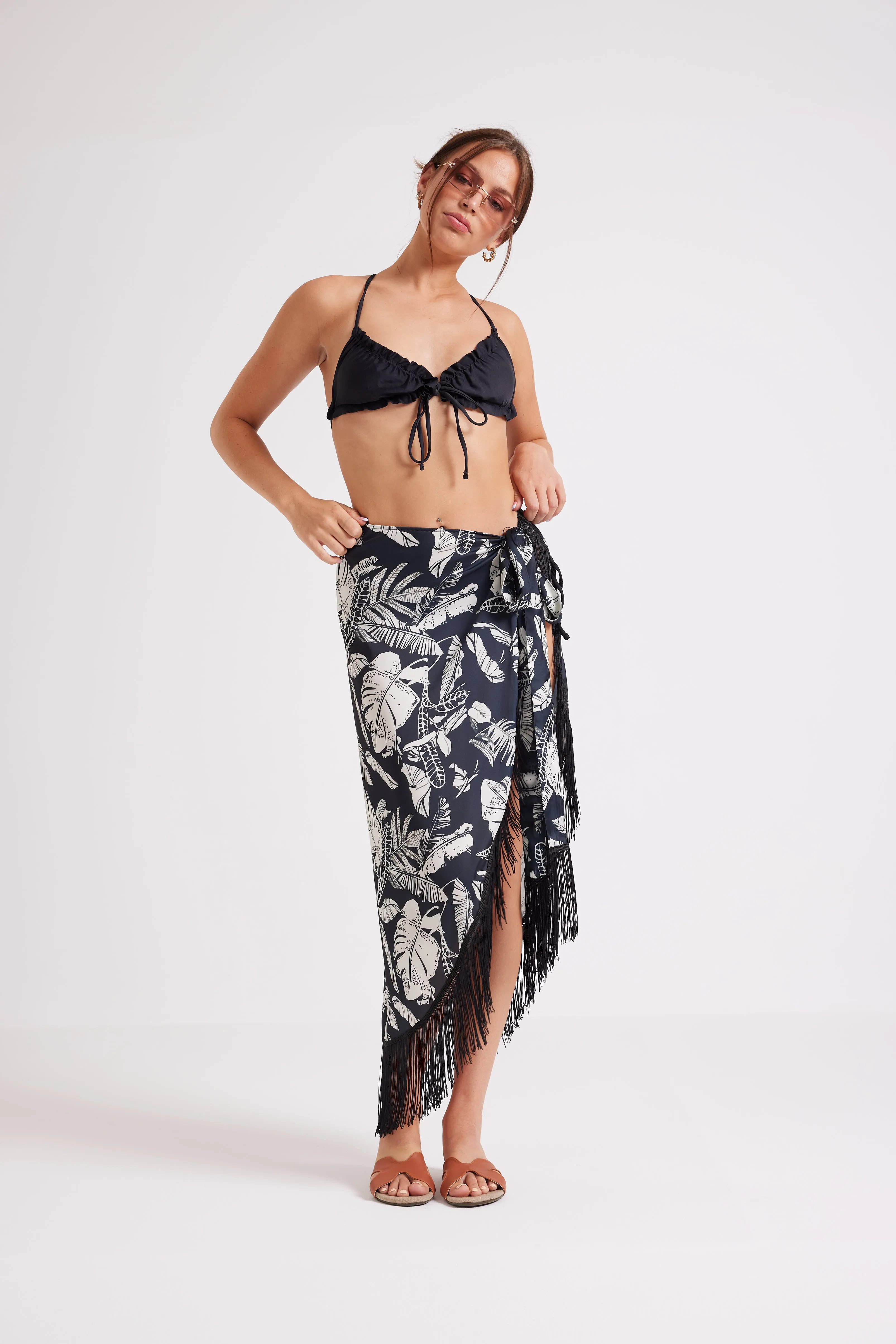 FEEL THE VIBE TASSEL SKIRT - BLACK