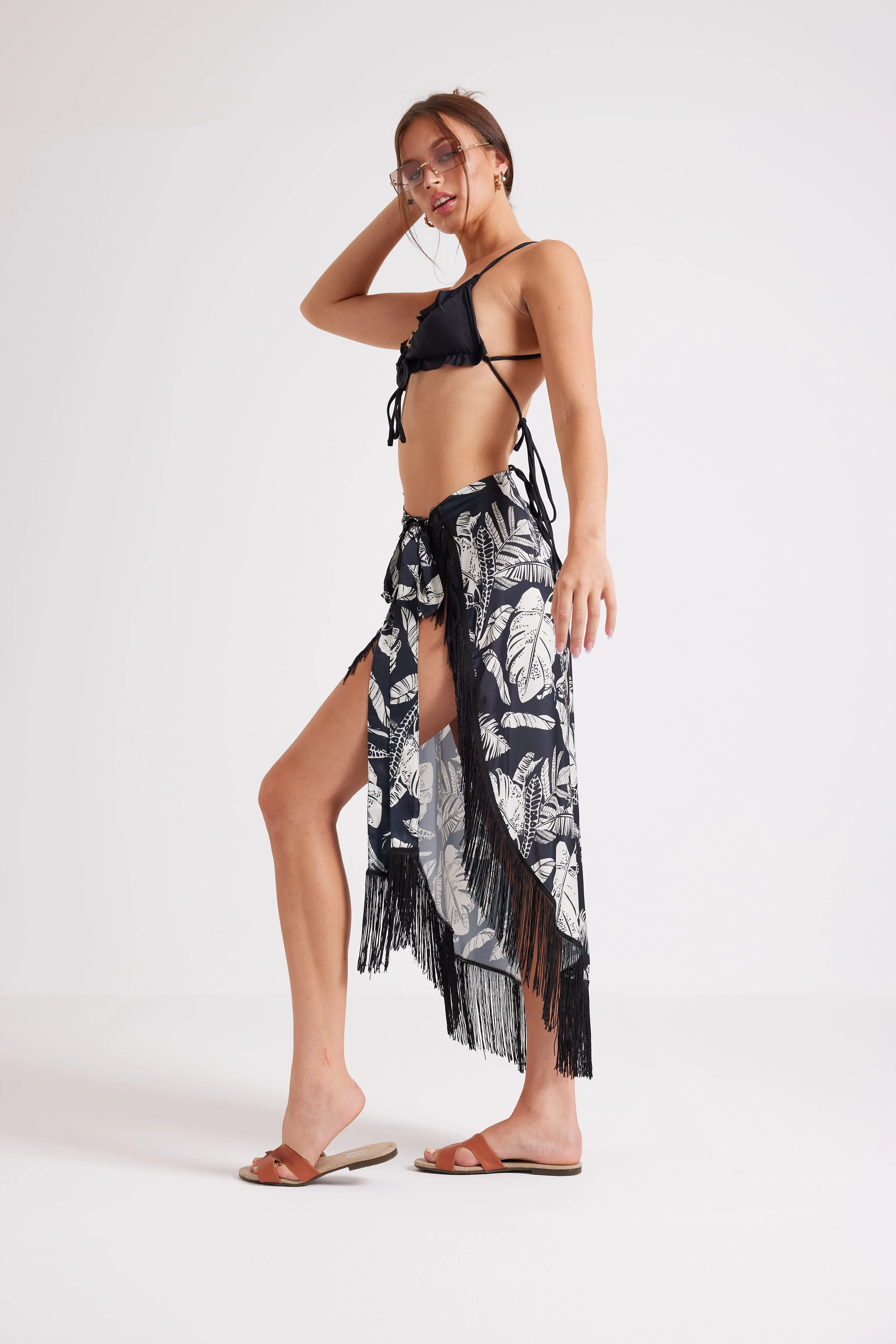 FEEL THE VIBE TASSEL SKIRT - BLACK