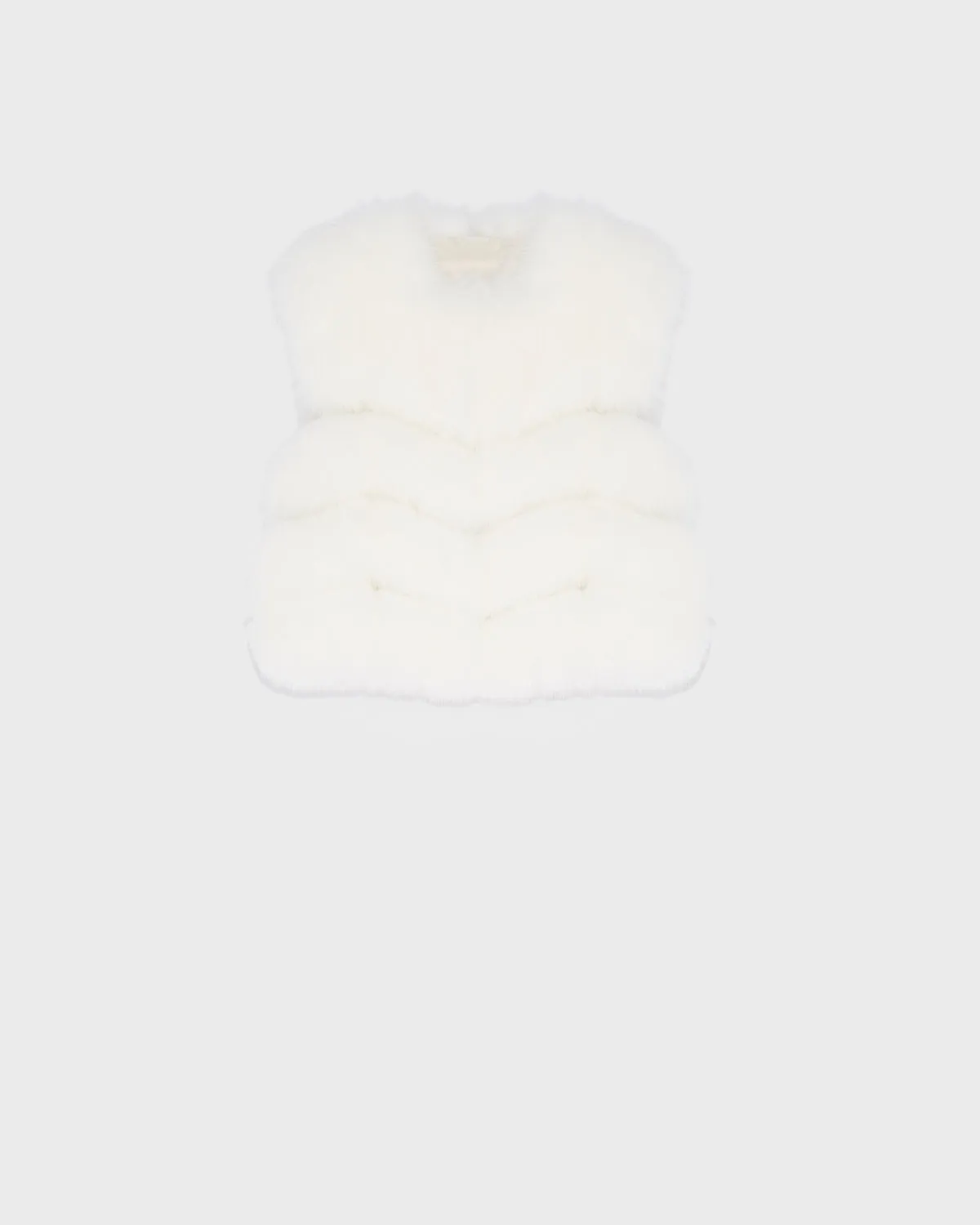 Short gilet in fox fur